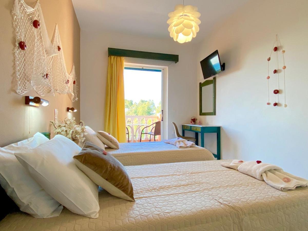 Pink & Blue Beachfront Apartments Acharavi  Exterior foto